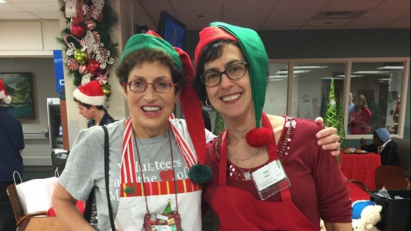 Helen Kalmans (right) with Mindy Wertheimer, director of Volunteer Services and Merchandising