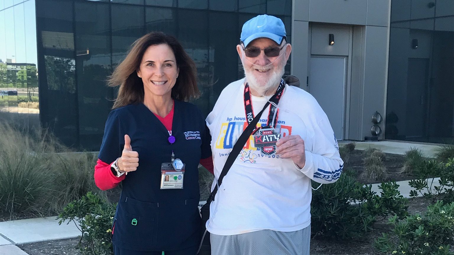 Radiation therapist Karrie Bellard and pancreatic cancer survivor Ken Rogers outside of MD Anderson West Houston