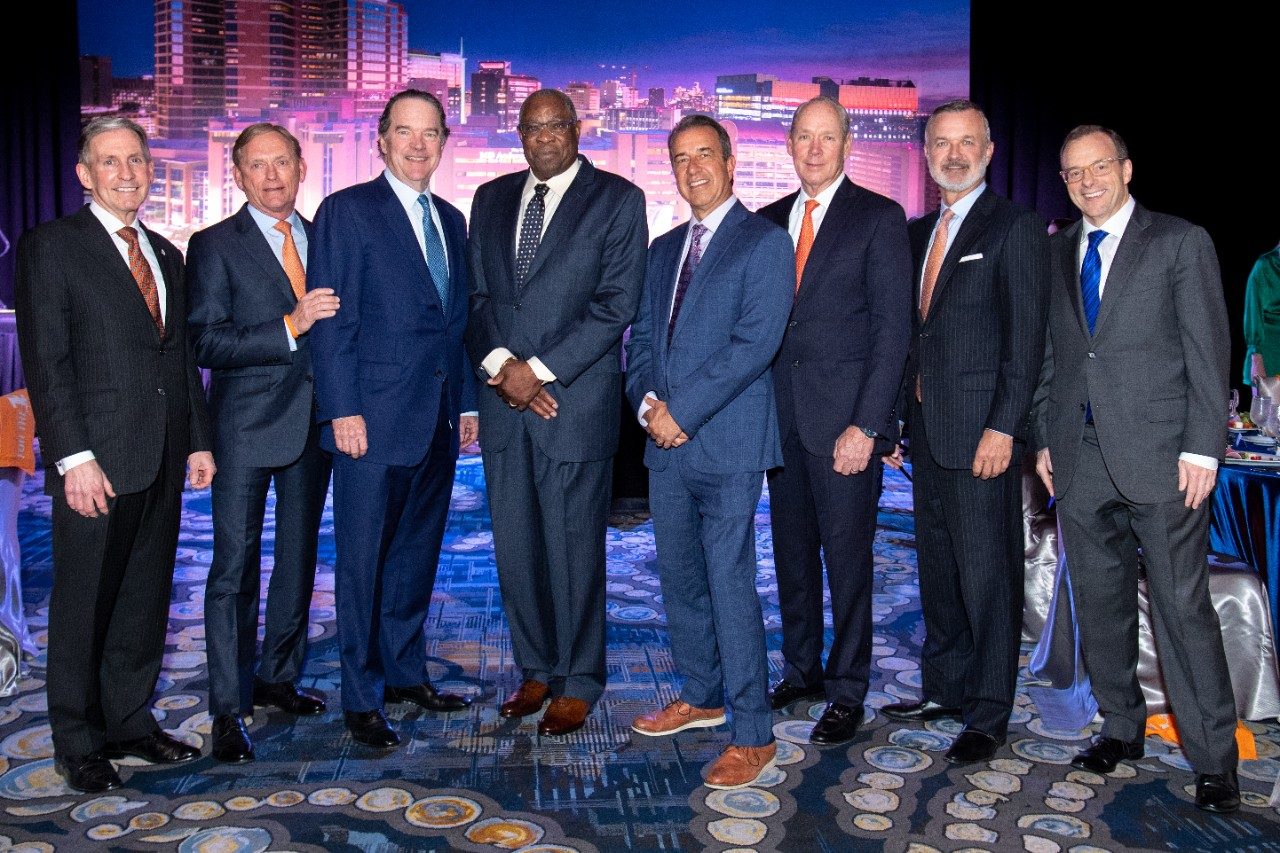 The event speakers, chairs and leadership from MD Anderson pose for a group photo.